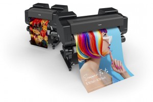 How does borderless printing compare on a Canon ImagePROGRAF printer vs a HP DesignJet Z6?
